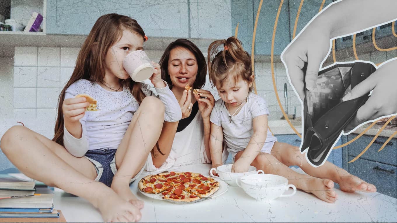 My Decision To Leave My Marriage Led To My Biggest Life Regret Woman sitting on counter with her two daughters eating frozen pizza