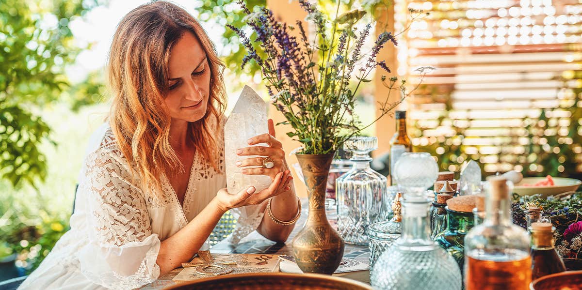 woman holding crystal