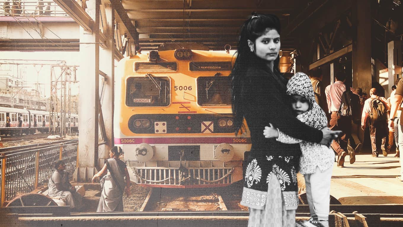 Indian woman and daughter at train station 