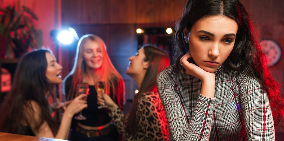 girl feeling left out by friend group