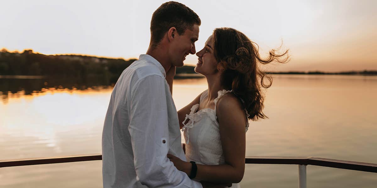 couple hugging on boat