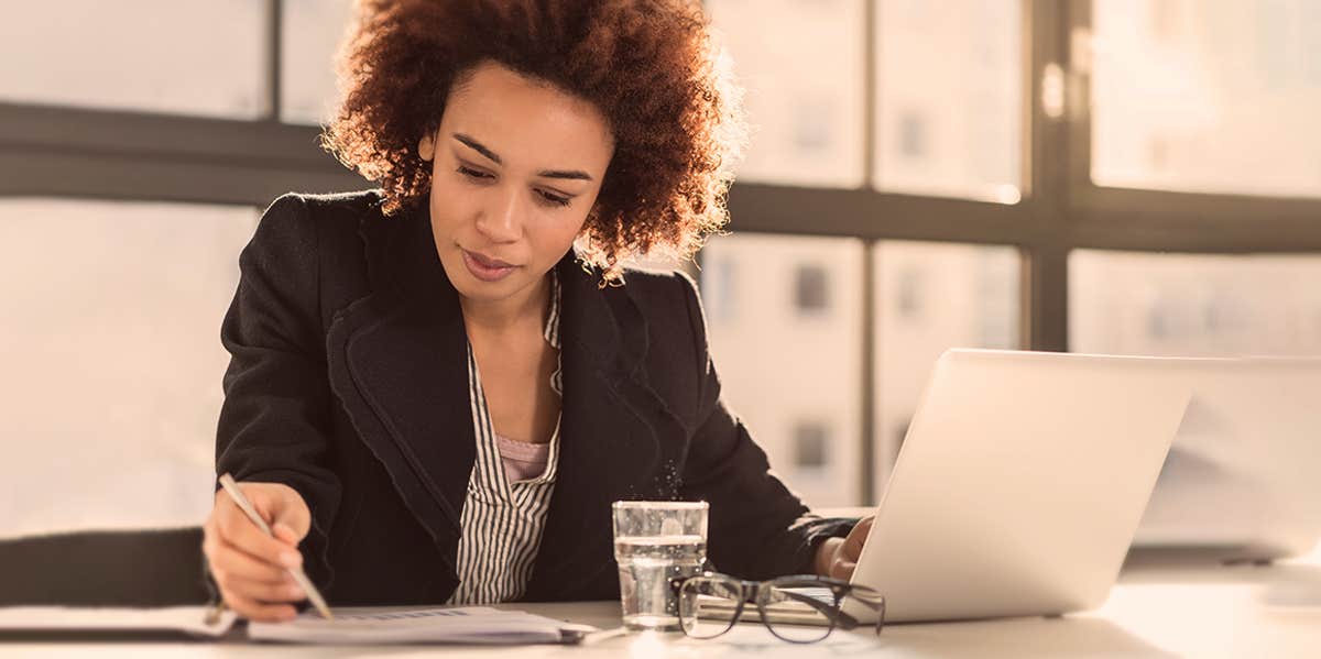 woman checking on document