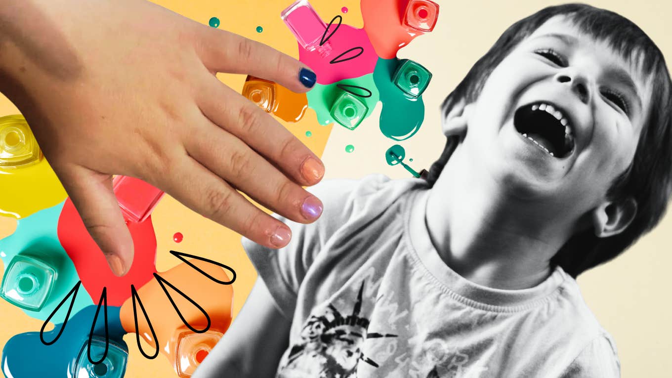 Happy young boy wearing his favorite colors on his nails