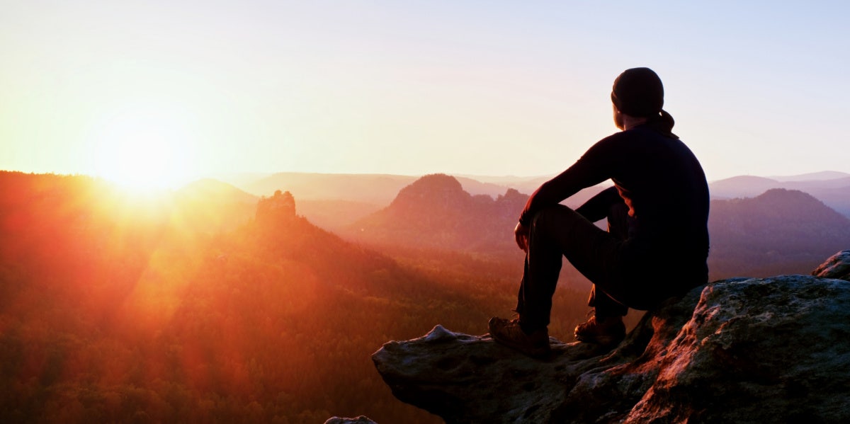 person looking out over a canyon