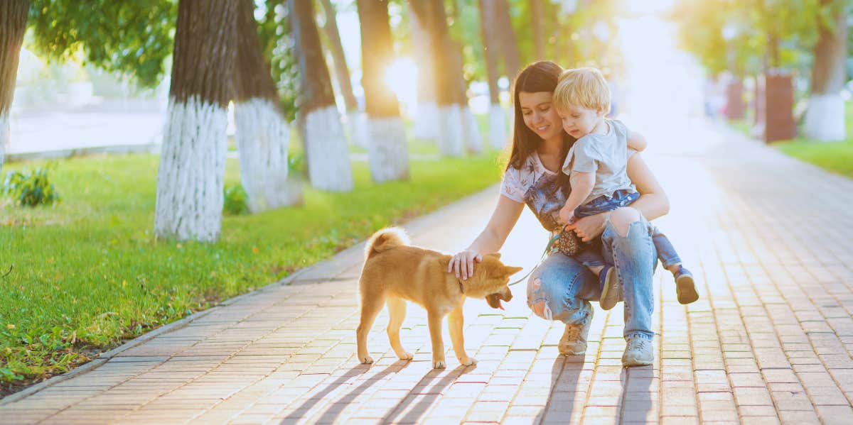 Mom Is 'Worried About The Future' After Neighbors' Dog Bites Her Toddler mom, child, and dog