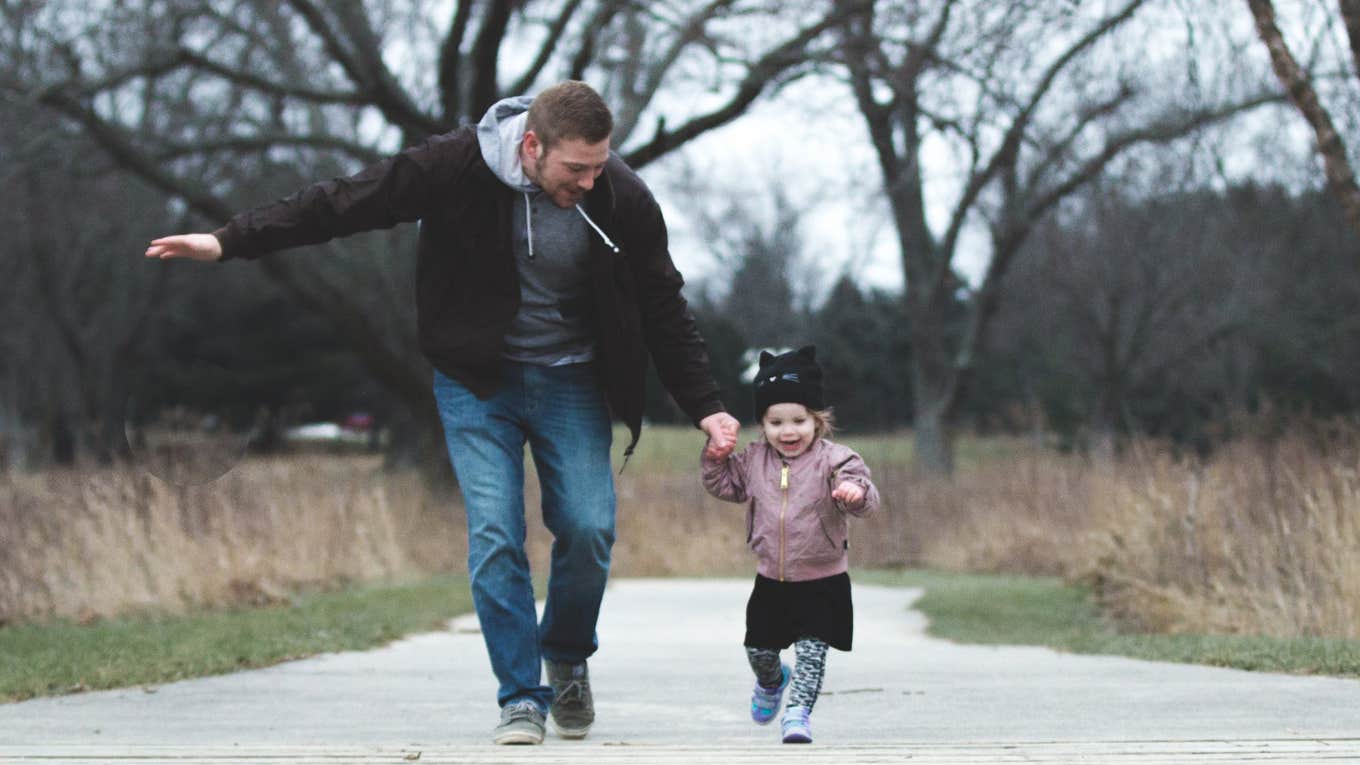 dad and daughter running