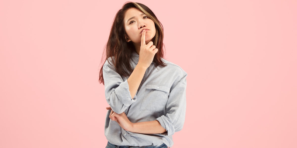 Why You Should Never Let Confusion Break You woman thinking with finger on face