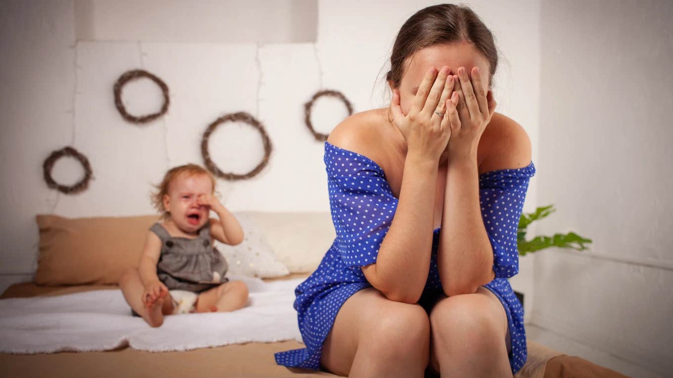 mom overwhelmed after snapping at her baby