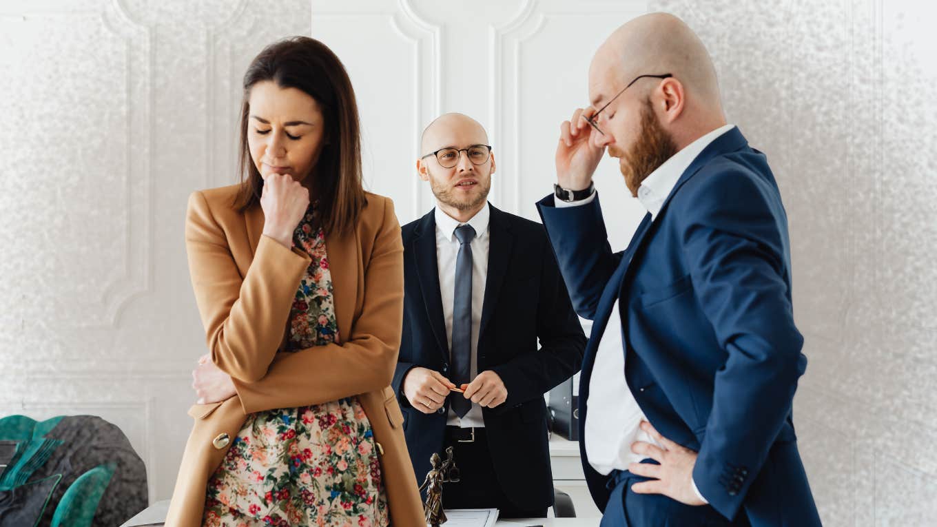 couple in lawyers office getting a divorce