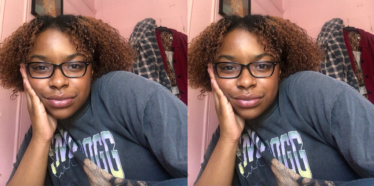 Nia Tipton, a young Black woman, smiles with her chin in her hand Nia Tipton