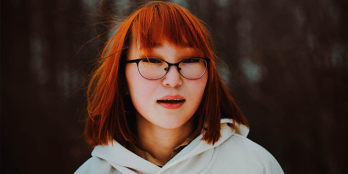 'Shallow' Traits That Actually Make You More Attractive woman in white hoodie