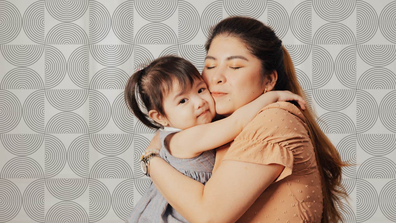 Why This Mom Won't Let Any Man Babysit Her Kids — Including Her Dad mother golding her daughter tightly