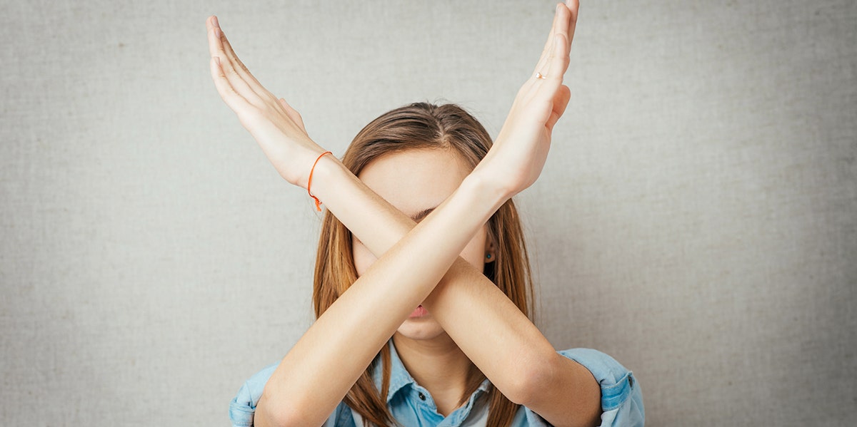 I Think Kids Are Like Shackles On Women's Ankles, So No Thank You woman making no sign in front of her face