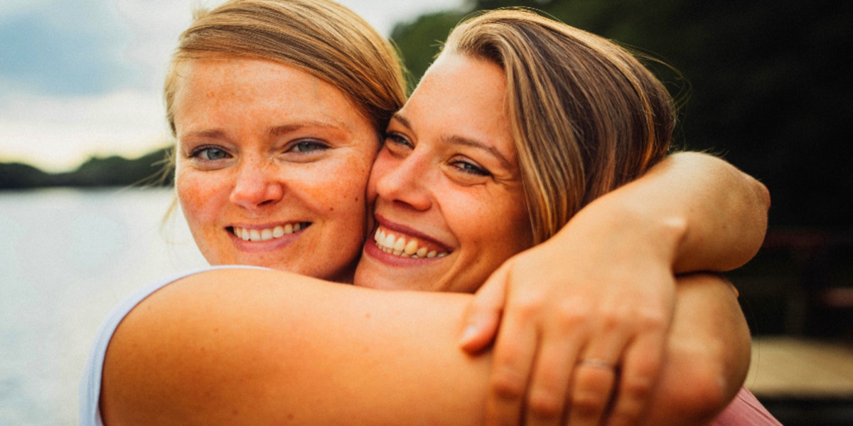 two friends embracing