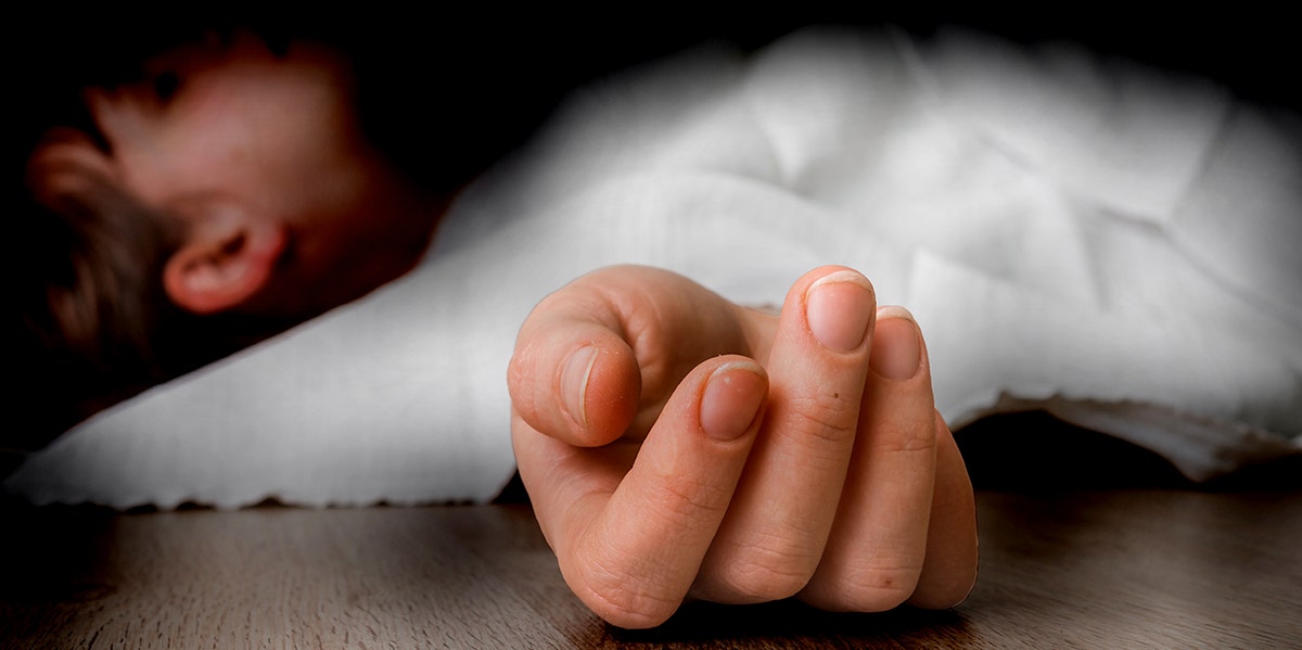 photo of dead teenager with hand outstretched