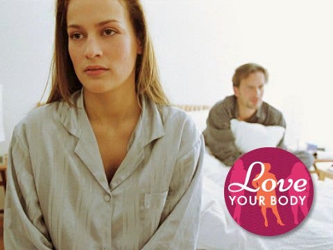 Do you hate your body? unhappy couple in bed