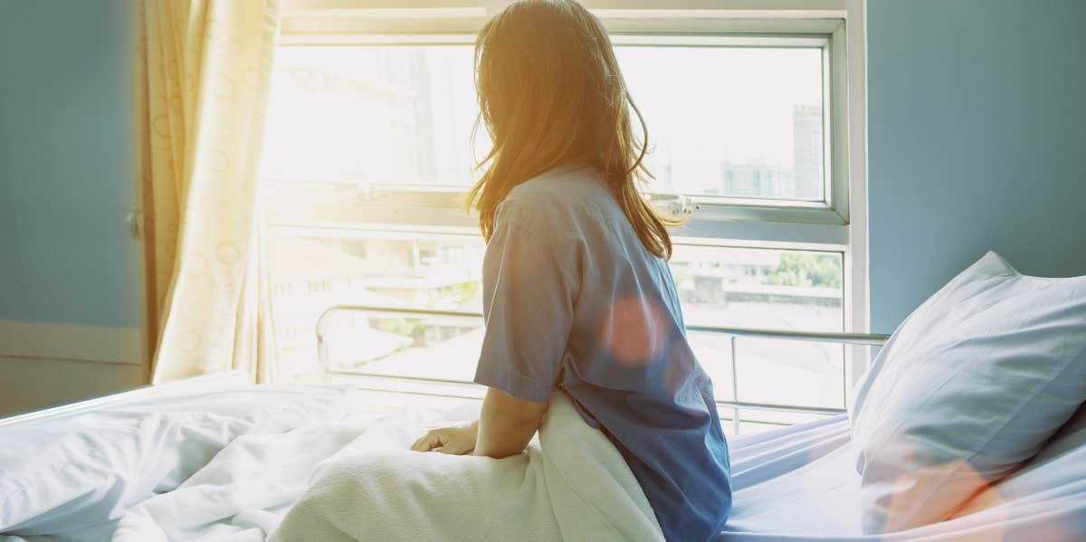 Woman in hospital bed