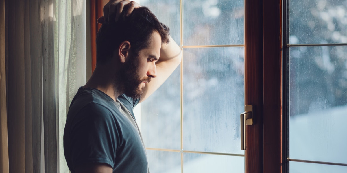 The One Crucial Thing Newly Sober People Should Do man looking out window