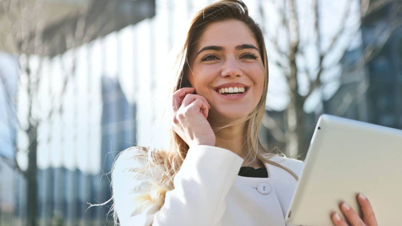 The One Personality Trait You Need To Be Irresistibly Attractive — And How To Get It pretty woman smiling big