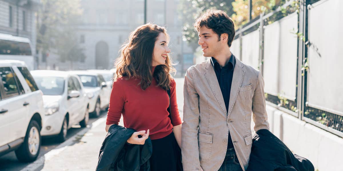 Don't Agree To A First Date Until You've Done This One Major Thing couple looking at each other