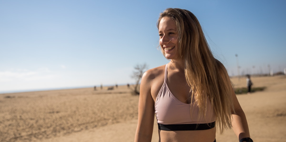 woman in sports bra solo