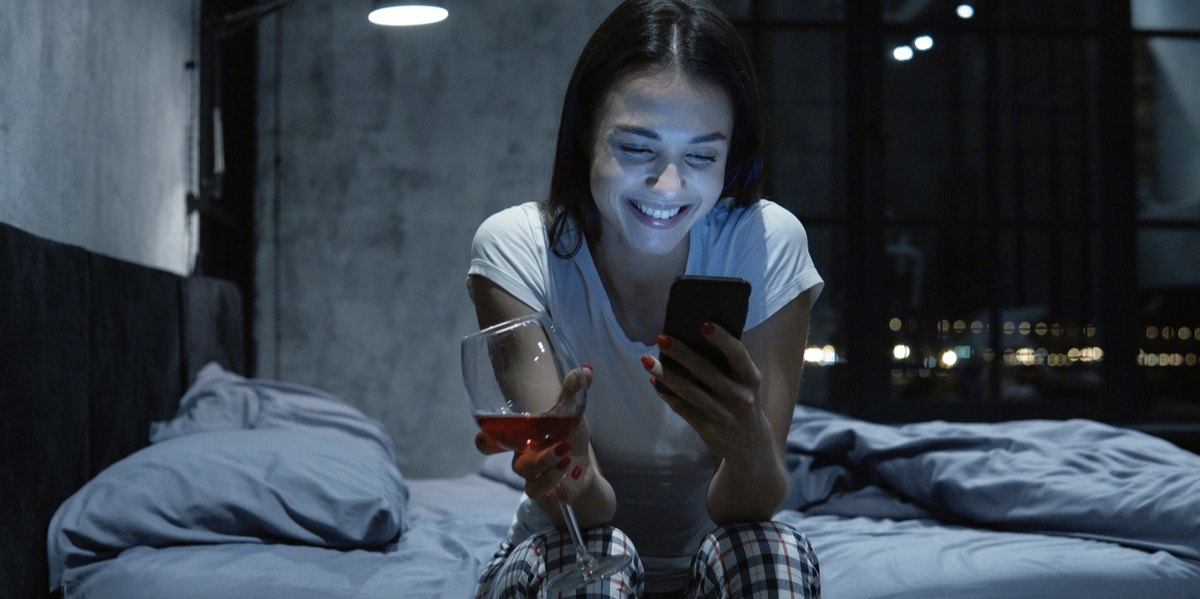 The 12 Online Dating Mistakes You Keep Making Over And Over woman on phone