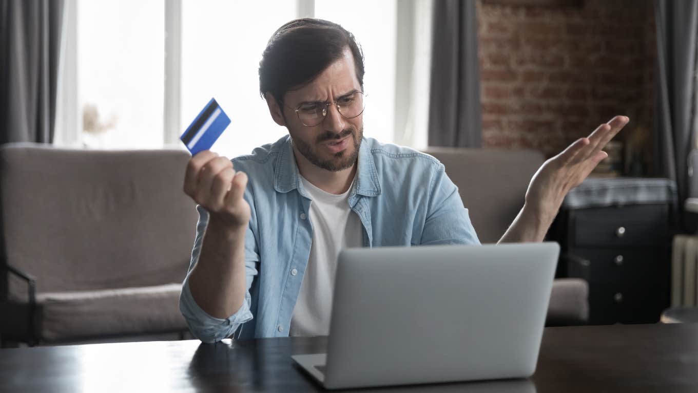 Online Shopper Asked To Leave A Tip That Would Go Toward Quarterly Bonuses For The Employees man annoyed while online shopping