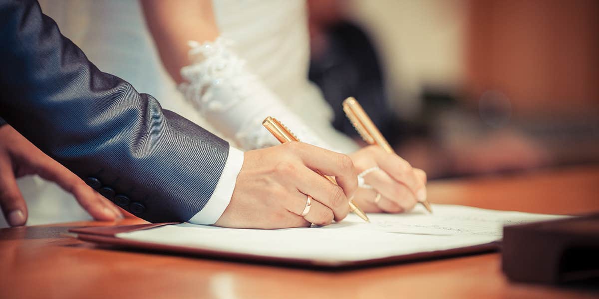 The (Open) Marriage Contract married couple signing contract