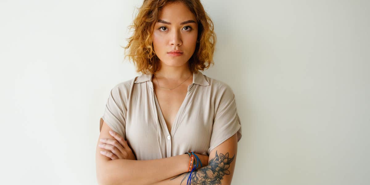 Why Our Opinions On The Opposite Sex Make Us More Accepting Of Domestic Abuse serious woman