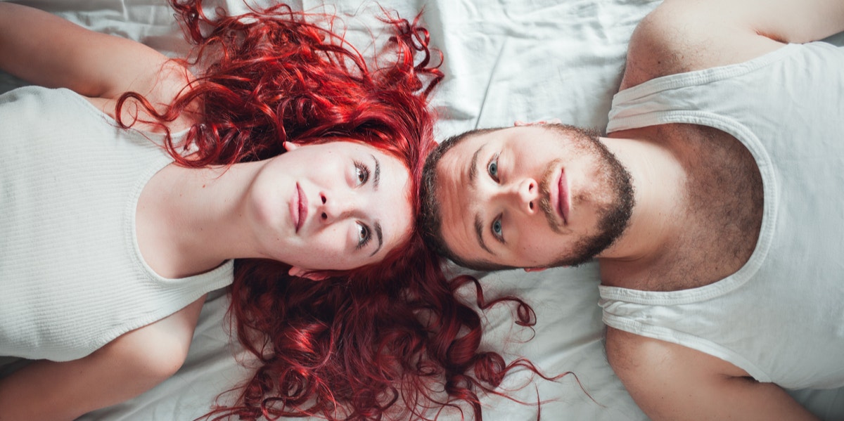 Why 'Opposites Attract' Is Basically A Myth couple laying head to head