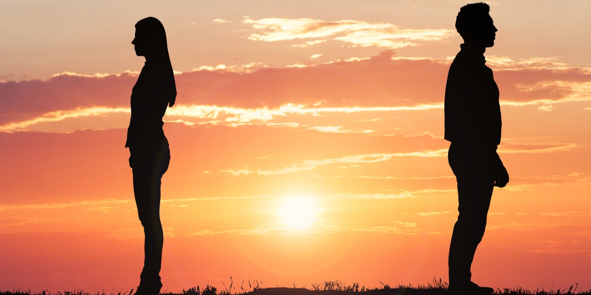 woman and man standing apart