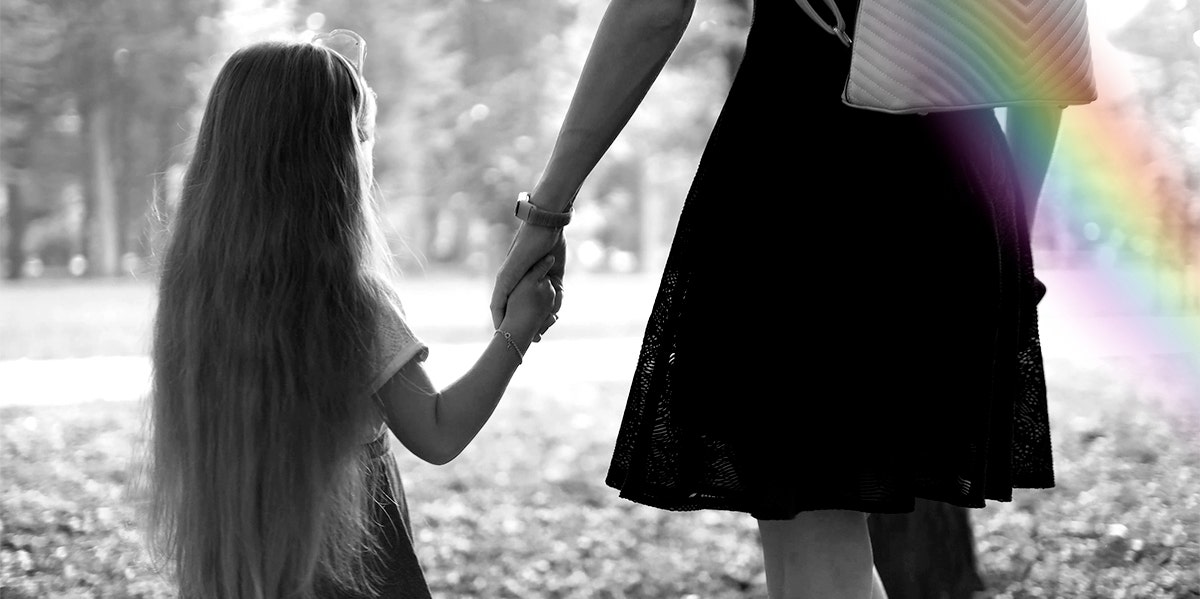 mother and daughter holding hands