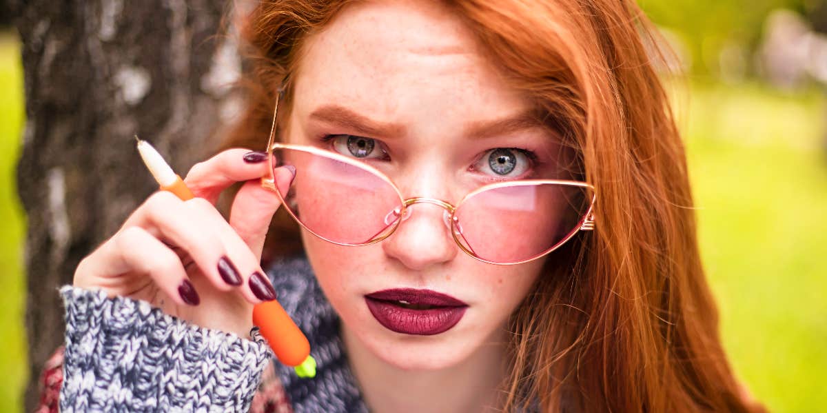 Outrageous demands Women looks skeptical over her glasses