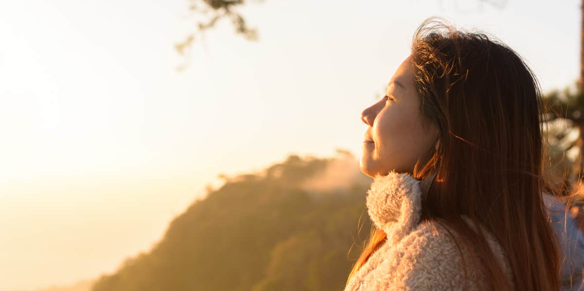 woman outside in sunlight