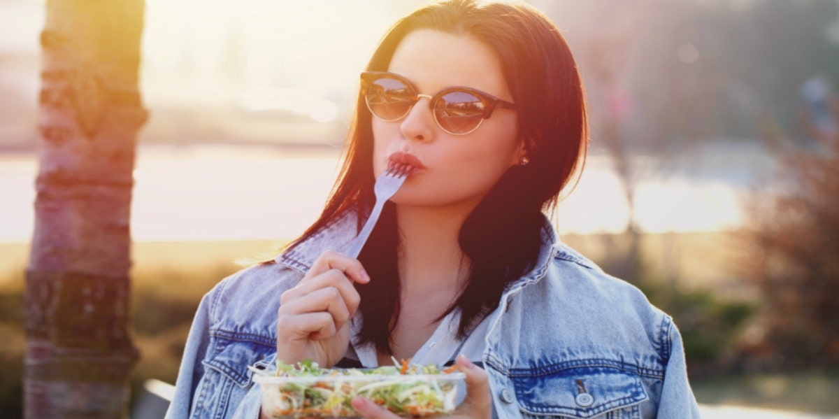 woman eating a salad