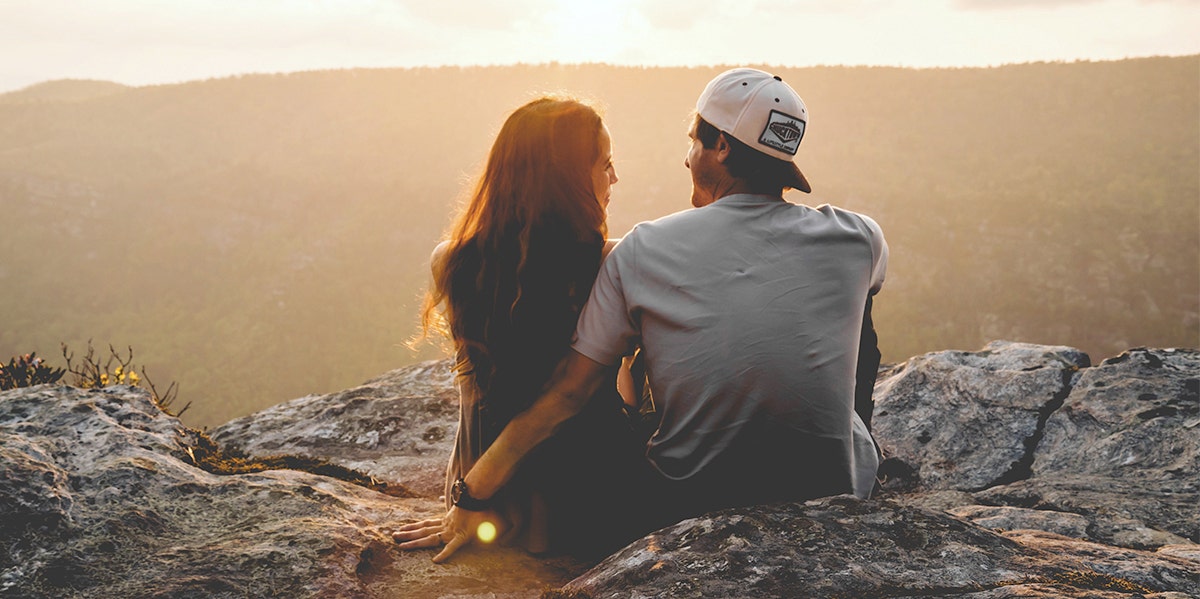Couple watching sunset Couple watching sunset