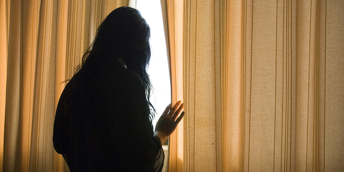 My Ex-Boyfriend Tracked Me And Watched Me Sleep woman in shadow on phone