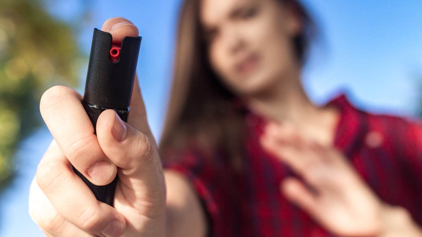Parents Allow Kids To Get Maced In The Face For School Project woman holding mace