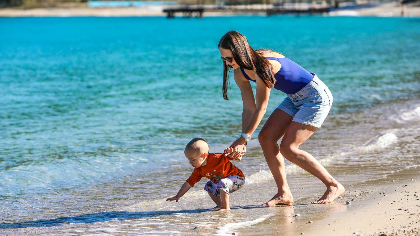 mom and baby on beach 