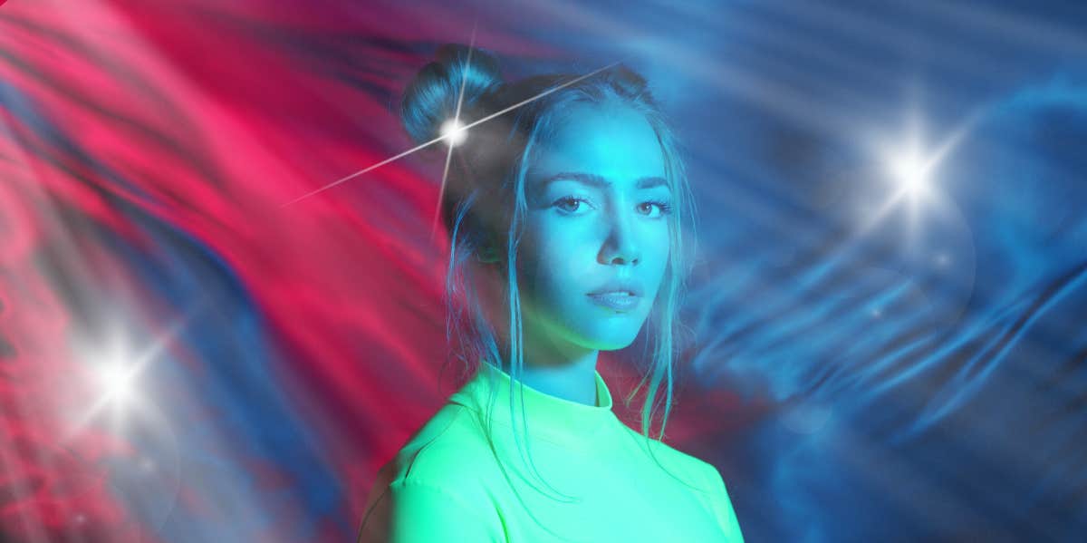 7 Signs You're Remembering Your Past Life In Dreams past life dream person with colorful lights