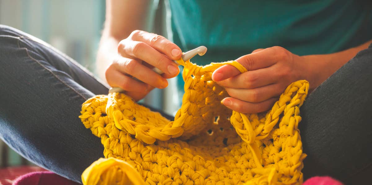 man knitting