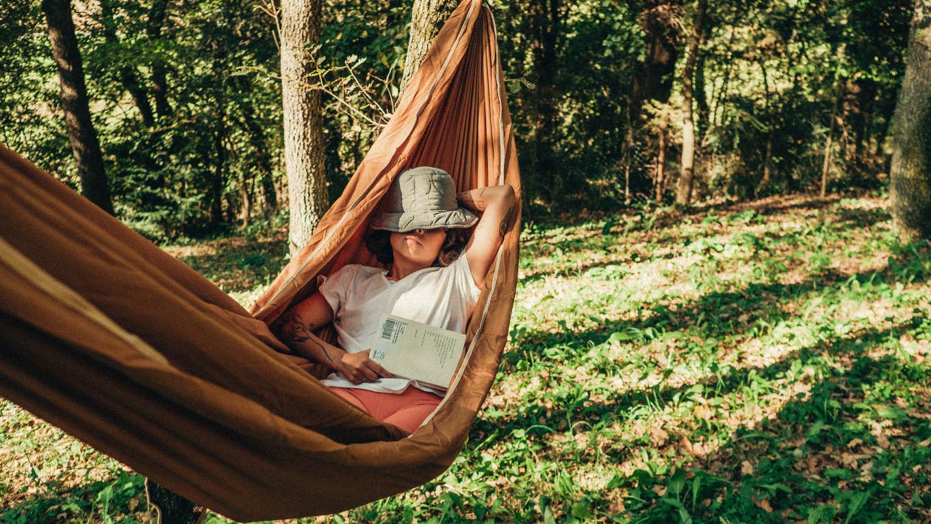 Woman napping in hammock