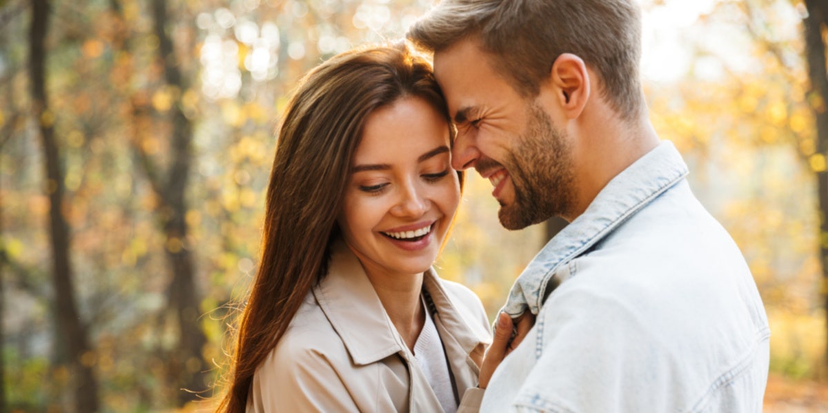 woman and man in woods 