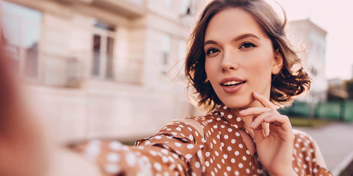 Rare Personality Traits That Make You A Psychopath Magnet woman taking selfie