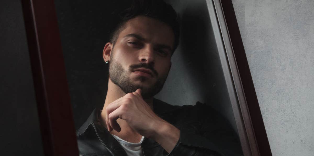 10 Subtle Signs The Person You Love Is A Narcissistic Sociopath man looking in mirror