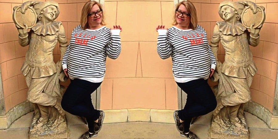 My Big Belly Should Be Seen As Just As Attractive As Another Woman's Big Butt photo of author posing with statue