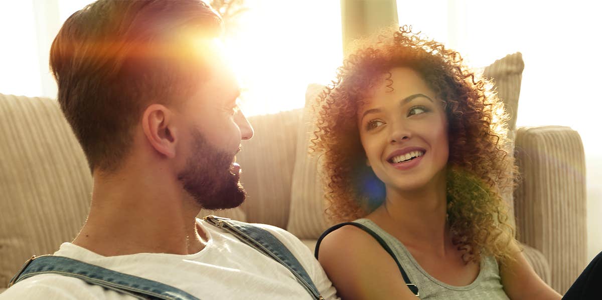 7 Phrases Couples In The Strongest Relationships Use Regularly woman flirting with man