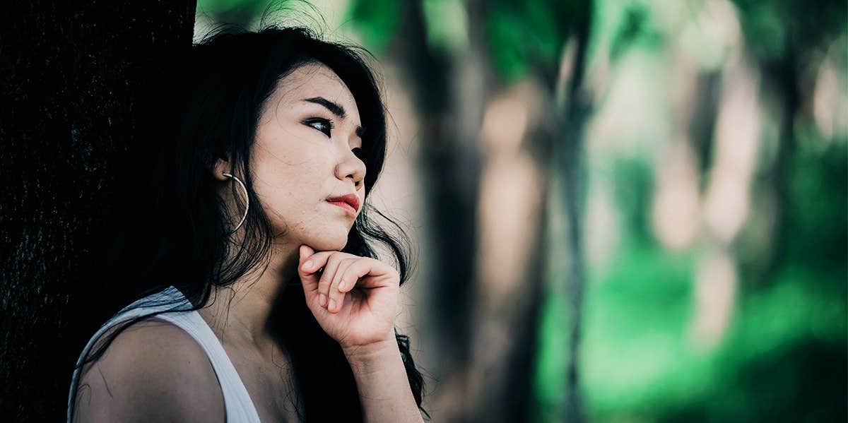 Signs You're A Physical Empath & Ways To Protect Yourself woman thinking