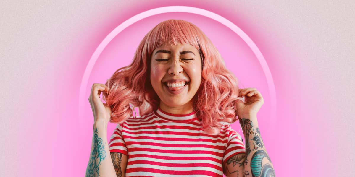 excited woman with pink hair