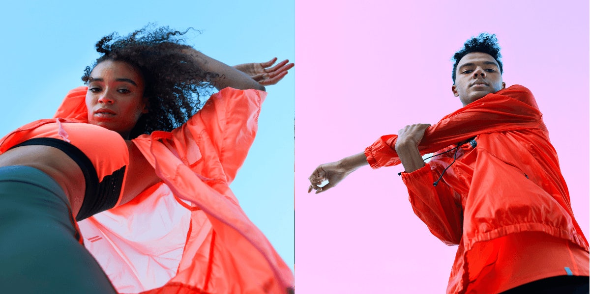 man and woman dancing colorful background